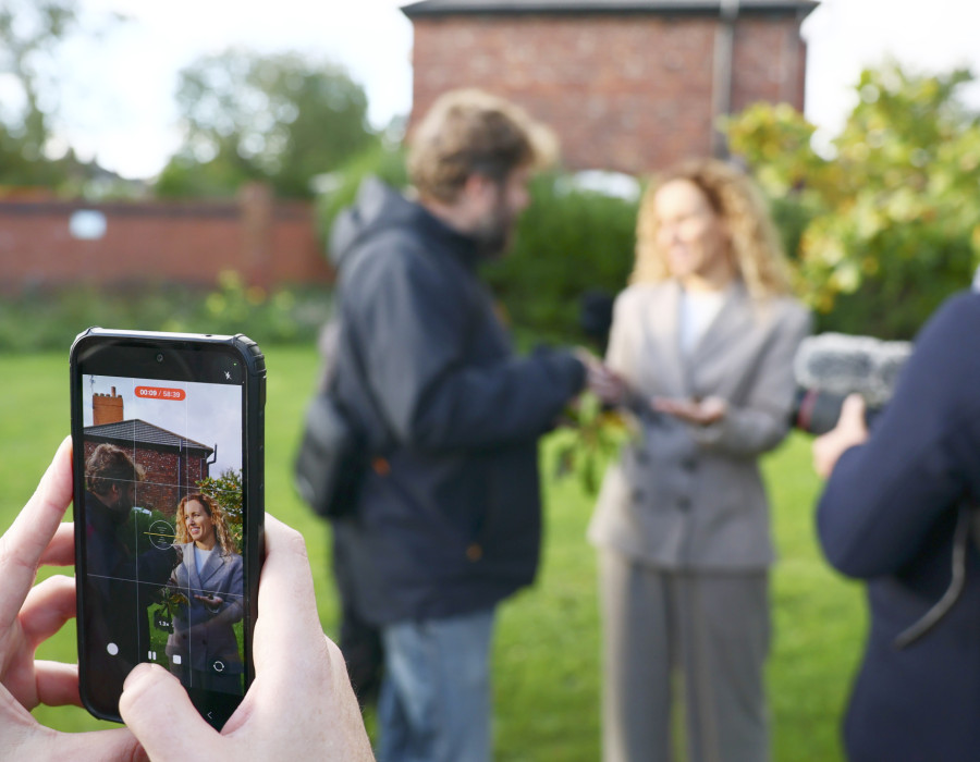 Katie White October with phone 2025